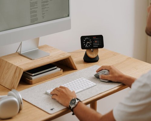 minimalist desk setup with natural light coming from window